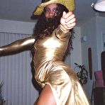 Fourth pic of 40 year old Patra works out each day to keep her body tight. She likes to wear her skin tight sexy gold dress that shows off her round black butt