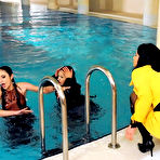 Second pic of Kitty Saliery pours champagne on Victoria Rose before clothed swimming in the pool