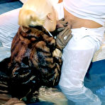 Second pic of Blonde Lena Cova has clothed sex right in the swimming pool with her short fur coat on