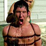 Fourth pic of Xana Star and Mika Tan fuck Daniel at both ends with strapons at the poolside