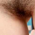 Second pic of Tyna Rubs her Hairy Pussy