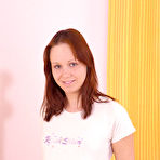 First pic of Cutie Petra H bares her white underwear and socks stuffing yellow dildo in her deep pussy.