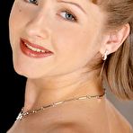 First pic of Nasty chick Tetyana unveiling her white lingerie and making crazy poses on wide bed.