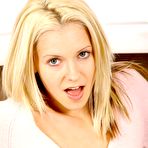 Second pic of Looking a little coy and shy at first, this teen Kaela Nubiles strips down to polka dot panties. 