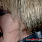 Second pic of SexPreviews - Sasha Knox busty blonde is bound in wooden stock and toyed by kinky couple
