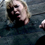 Fourth pic of SexPreviews - Sasha Knox busty blonde is bound in wooden stock and toyed by kinky couple