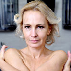 Fourth pic of [Anilos] Short haired older mature housewife getting naked in the kitchen - IWantMature.com