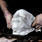 Third pic of SexPreviews - Claire Adams is bound tightly in red tape and toyed to orgasm in dungeon