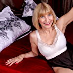 Second pic of Naughty American mature lady playing alone
