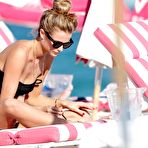 First pic of Kate Bock in black bikini on a beach