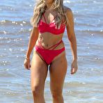 Second pic of Tallia Storm in red bikini on a beach