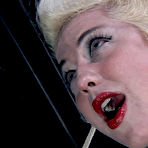 Second pic of SexPreviews - Niki Nymph busty blonde with red ballgag is rope bound and toyed