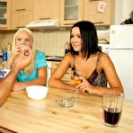 First pic of Lara Amour and Sunny Skies take a shower together then share one cock in the kitchen