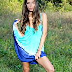 First pic of Free Kenya displays her petite body and meaty pussy on the grassy field.