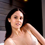 First pic of Free Sade Mare strips on the bed baring her slender body and tight ass.