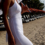 First pic of Free Elin displays her smoldering body as she strips by the beach.