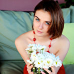 First pic of Free Alice Shea plays with her nipples as she bares her sweet pussy on the couch.