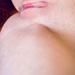 Fourth pic of Free Kery bares her meaty ass and delectable pussy on the table.