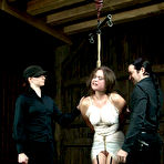 Third pic of SexPreviews - Charlotte Vale busty brunette is bound in garter stockings and spanked by dominant couple