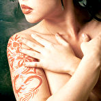 Fourth pic of Asian Masuimi Max with big color tattoo on her back shows off her perfect nude body