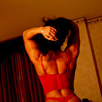 Third pic of Dark haired muscle latina Monica Martin in red underwear shows off her fine ass cheeks