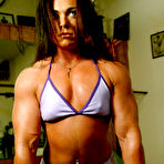 Second pic of Bodybuilder Kim Bruno in sexy uniform works out at the gym and flashes her small tits