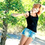 First pic of Horny redhead chick Violla A is outdoor shaking heavy boobs and spreading sexy beaver