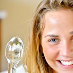 First pic of Blonde chick Courtney Dillon playing with the nub and showing small tits in pool