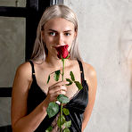 First pic of XXX Susann strips on the bed as she playfully rubs the rose on her smooth pussy.met art babe galleries 19