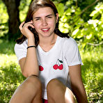 Second pic of XXX Zhenya Mille flaunts her slender body with small tits as she poses in the forest.met art teen porn 19