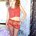 First pic of Nasty curly girl strips and shows her sexy small tits and wet hairy slit pics