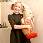 First pic of Sexy girl in a short dress teasing and stripping revealing her hot body before camera pics