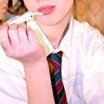 Second pic of Sexy coed taking off her uniform and shamelessly exposing her sweet breasts pics