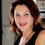 First pic of Naughty brunette MILF chick Ava Austin takes all off and keeps her sexy stockings on