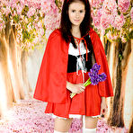 First pic of This hot shapely doll enjoys surrounding herself with flowers and shows her perfect wet pussy as well. pics