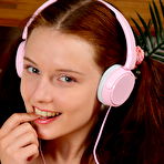 Third pic of Watch as this extremely cute redhead girl gets fully naked and poses wearing nothing but her cute pink socks. pics