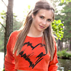 Second pic of This amazing brunette girl gets off her red shirt and blue shorts and shows you her stunning naked body. pics