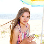 First pic of Check out this cute shapely model that enjoys getting off her swim suit and show off at the local sea shore. pics