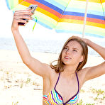 Second pic of Check out this cute shapely model that enjoys getting off her swim suit and show off at the local sea shore. pics