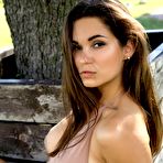 First pic of Busty young Faith with amazing ass poses outdoor