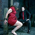 Second pic of SexPreviews - Catherine DeSade in red dress masked and bound with tits exposed toyed to orgasm