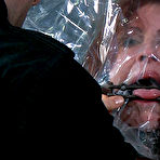 Third pic of SexPreviews - Catherine DeSade in red dress masked and bound with tits exposed toyed to orgasm