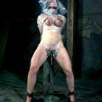 Fourth pic of SexPreviews - Catherine DeSade in red dress masked and bound with tits exposed toyed to orgasm