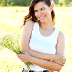 First pic of Nude Suzanna A poses in the meadow baring her luscious body.