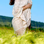 First pic of Nude Rosella flaunts her gorgeous body as she poses on the grassy field.