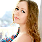 Third pic of Nude Newcomer Julia Sweet shows off her curvy body with amazing trunk on the chair.