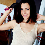 Second pic of Nude Newcomer Hayli Sanders flaunts her nubile body and small pussy on the chair.