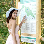 First pic of Nude Newcomer Oxana Chic shows off her sexy, tanned body as she strips outdoors.