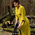 Third pic of Nude Dakota A took pictures of her delectable pussy in the forest.