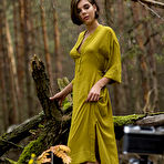 Fourth pic of Nude Dakota A took pictures of her delectable pussy in the forest.
